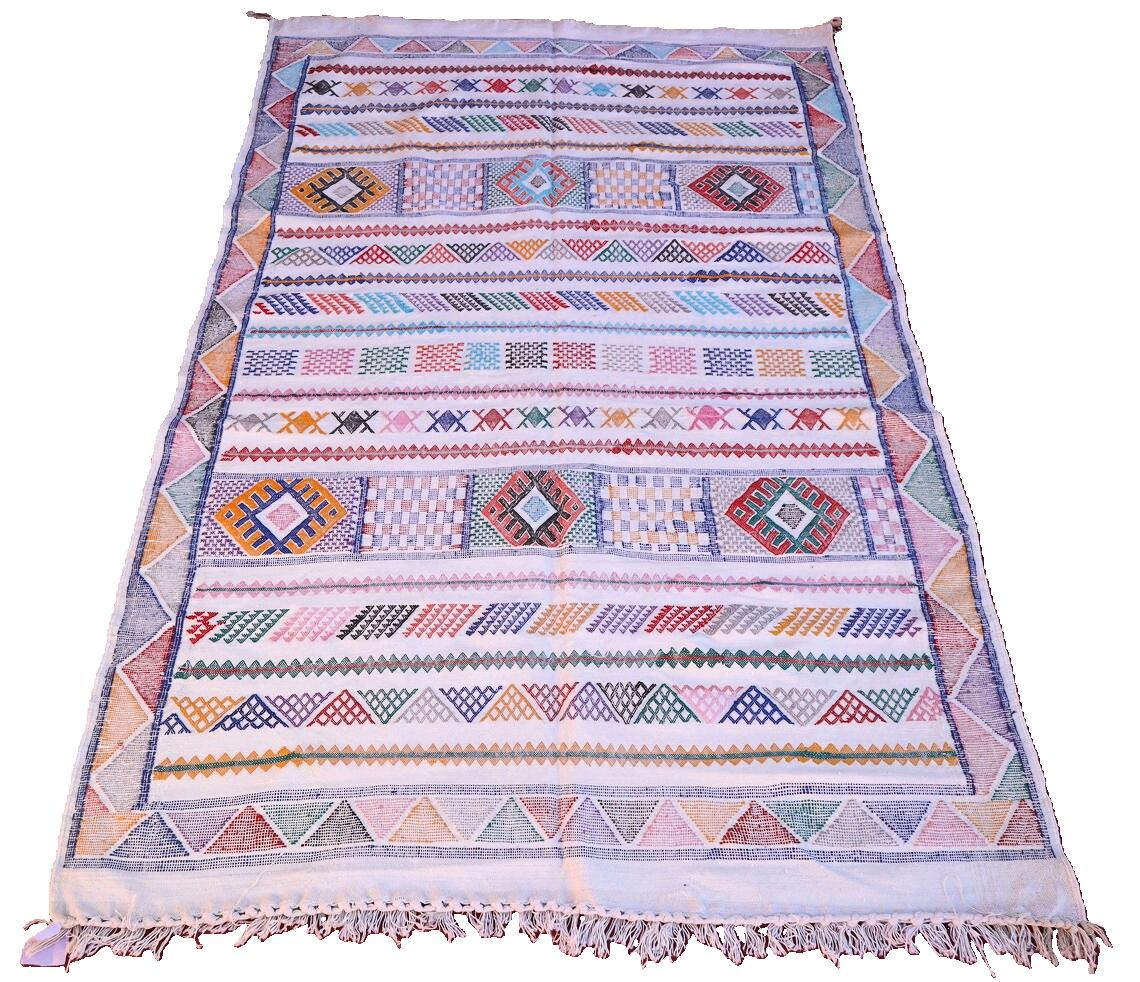 levate your home decor with our white jute rug (3x5)! Handwoven in the timeless Berber tradition, this fluffy Moroccan rug offers a serene and sophisticated aesthetic. The pristine