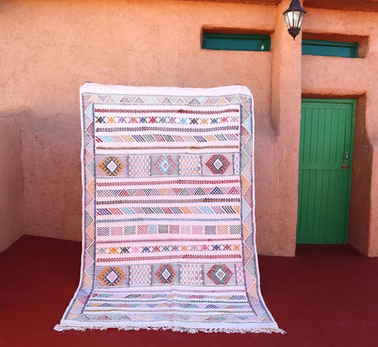 levate your home decor with our white jute rug (3x5)! Handwoven in the timeless Berber tradition, this fluffy Moroccan rug offers a serene and sophisticated aesthetic. The pristine